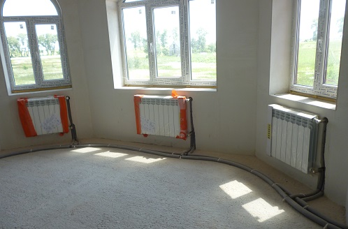 радиаторное отопление боковое подключение